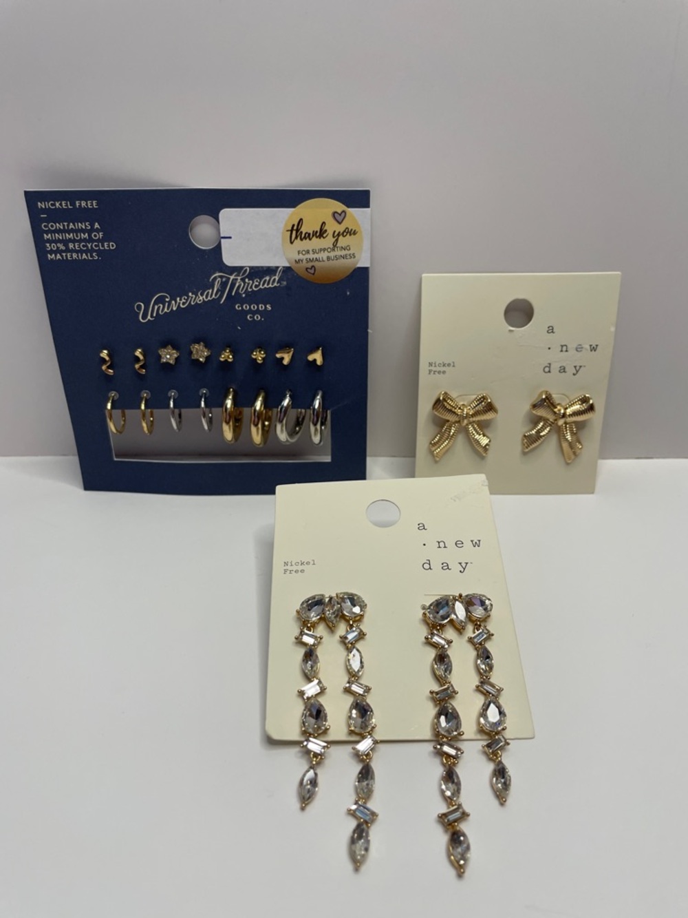 NWT Universal Thread Gold Crystal Linear Drop Earrings and Gold Stud Set.